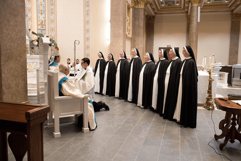 Why do nuns lay on the floor when taking vows? Christian Faith Guide